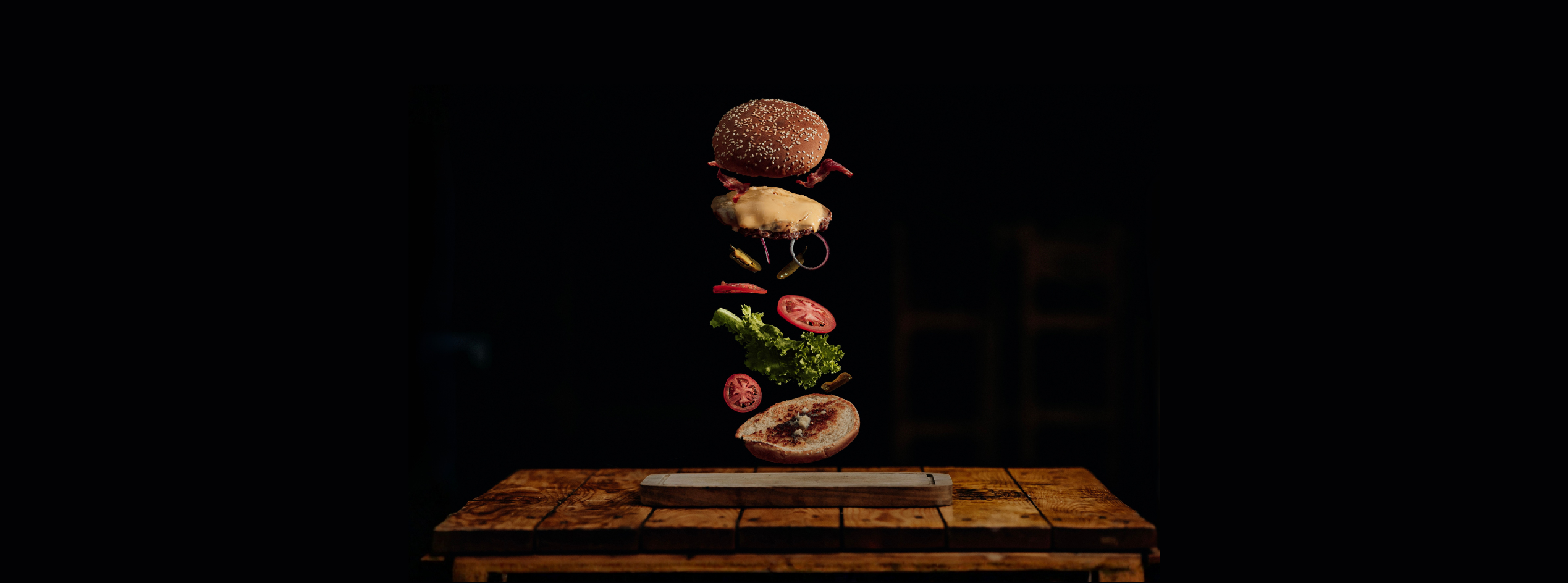 Parts of a burger falling